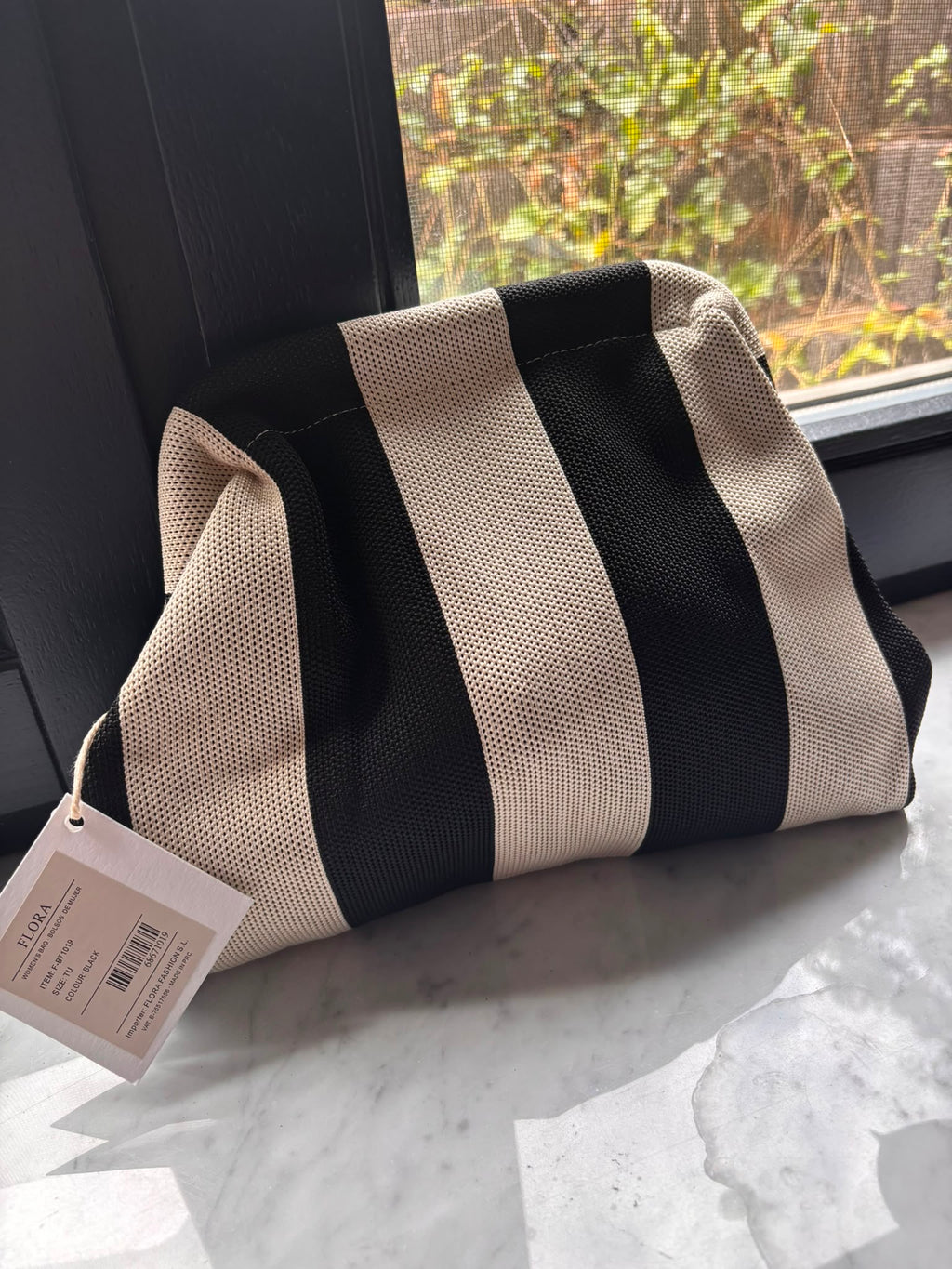 Gestreifte Strick-Clutch