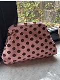 Gepunktete Strick-Clutch